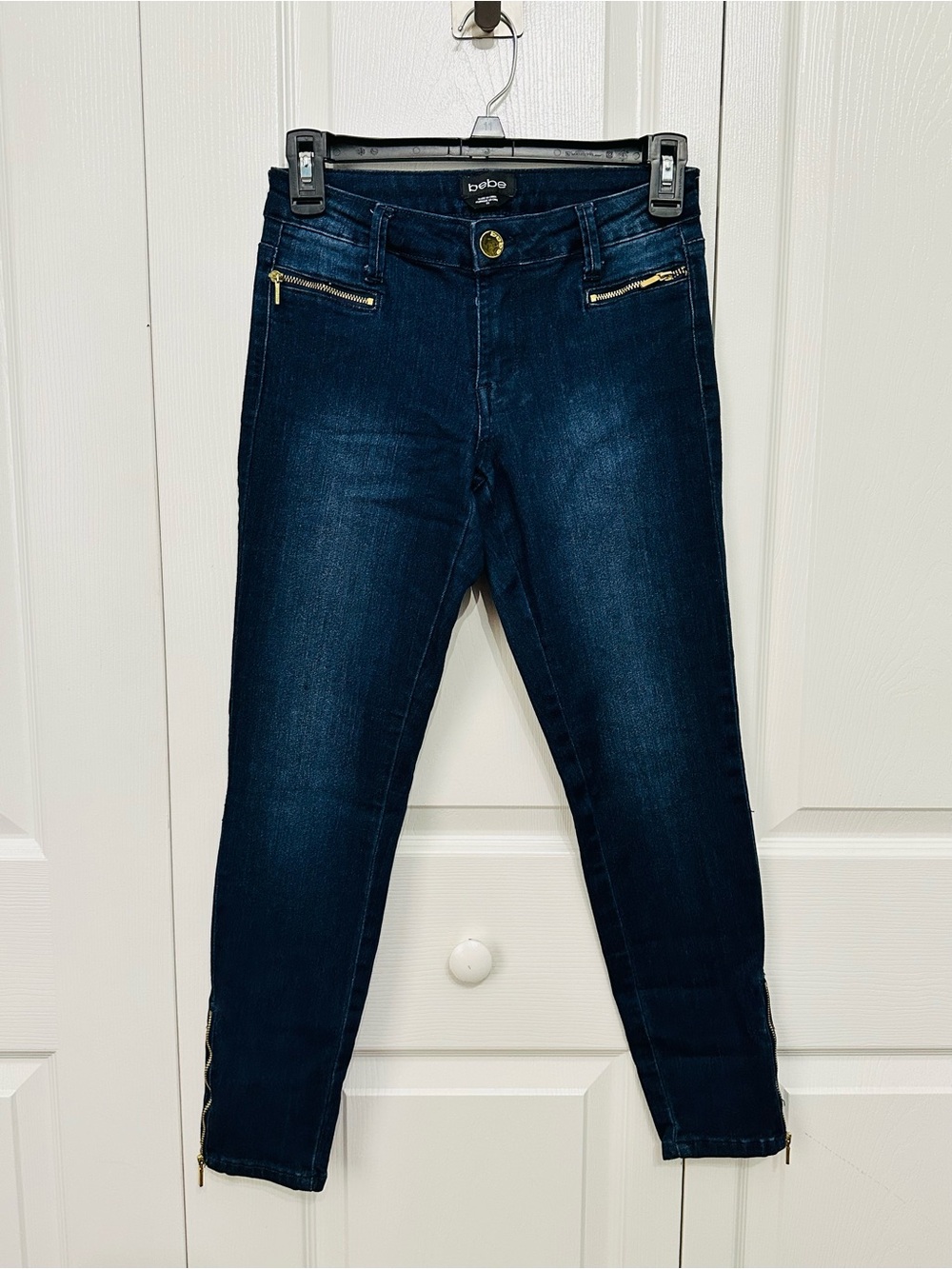 bebe Dark Blue Skinny Jeans with Gold Hardware